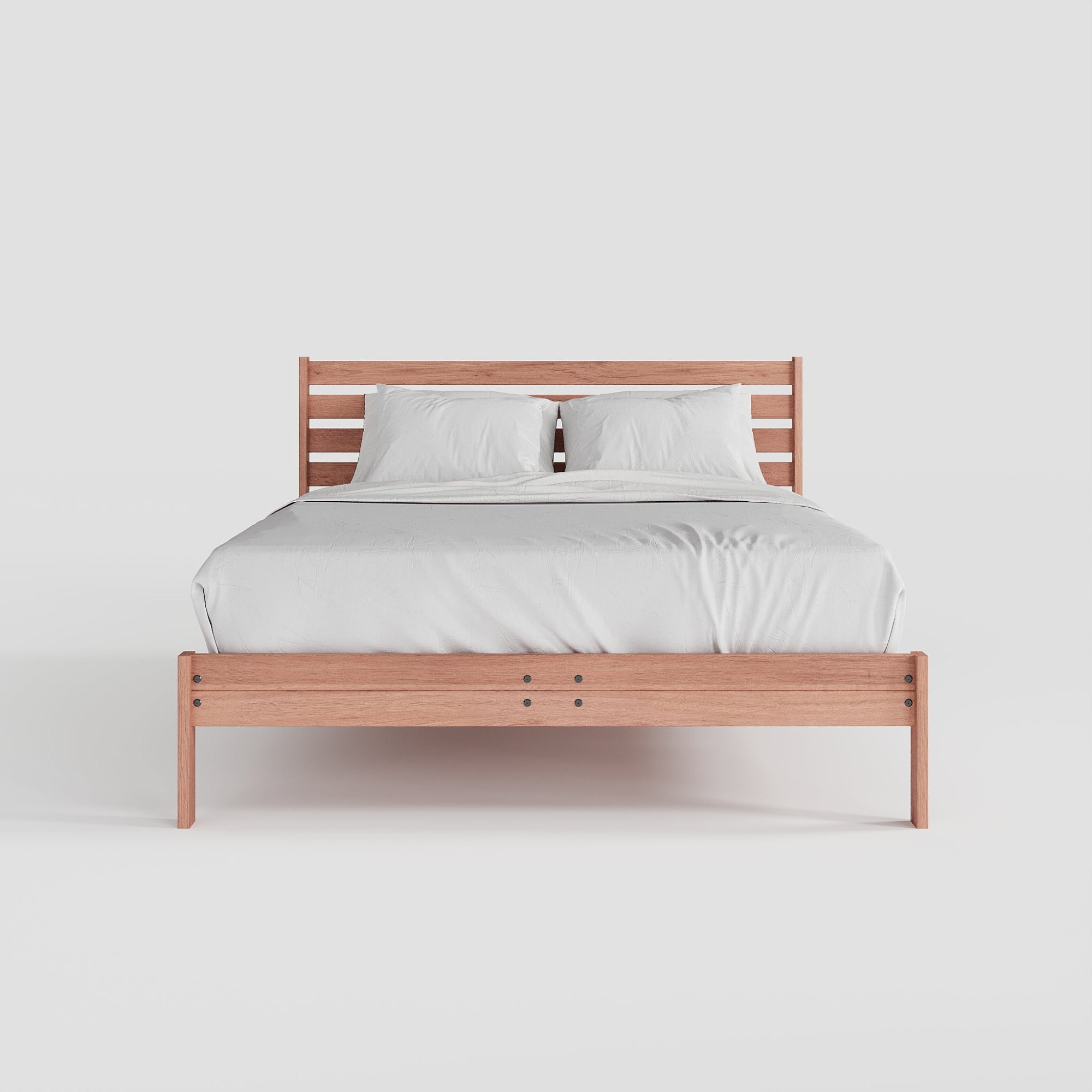 Wooden bed frame with white bedding on a light gray background